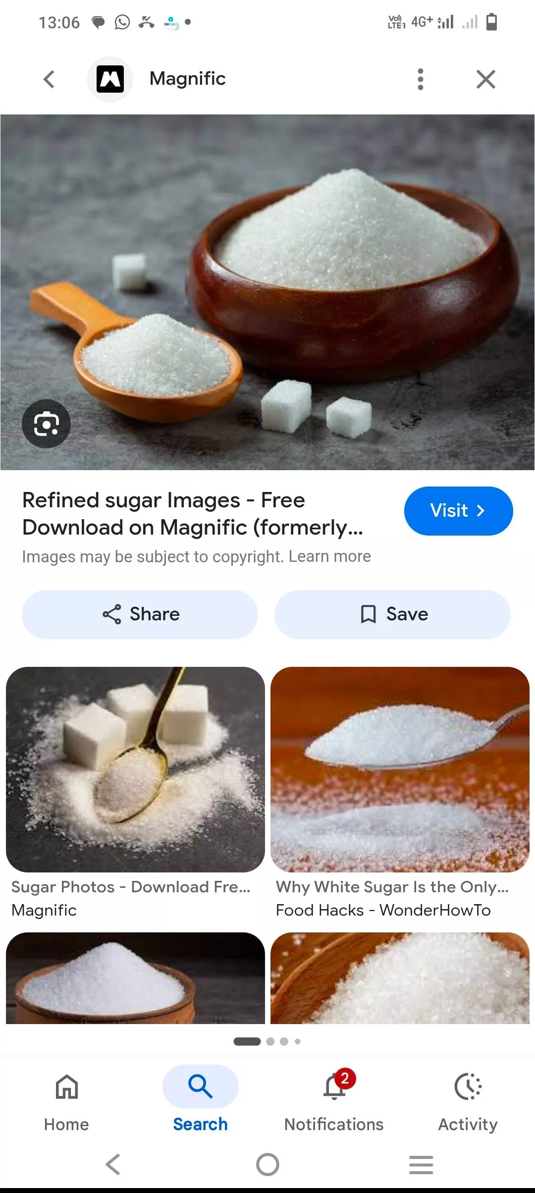 Refined white sugar in a clear container with a spoon, showcasing its fine granules, TawakkalMuttonShop Khammam product.