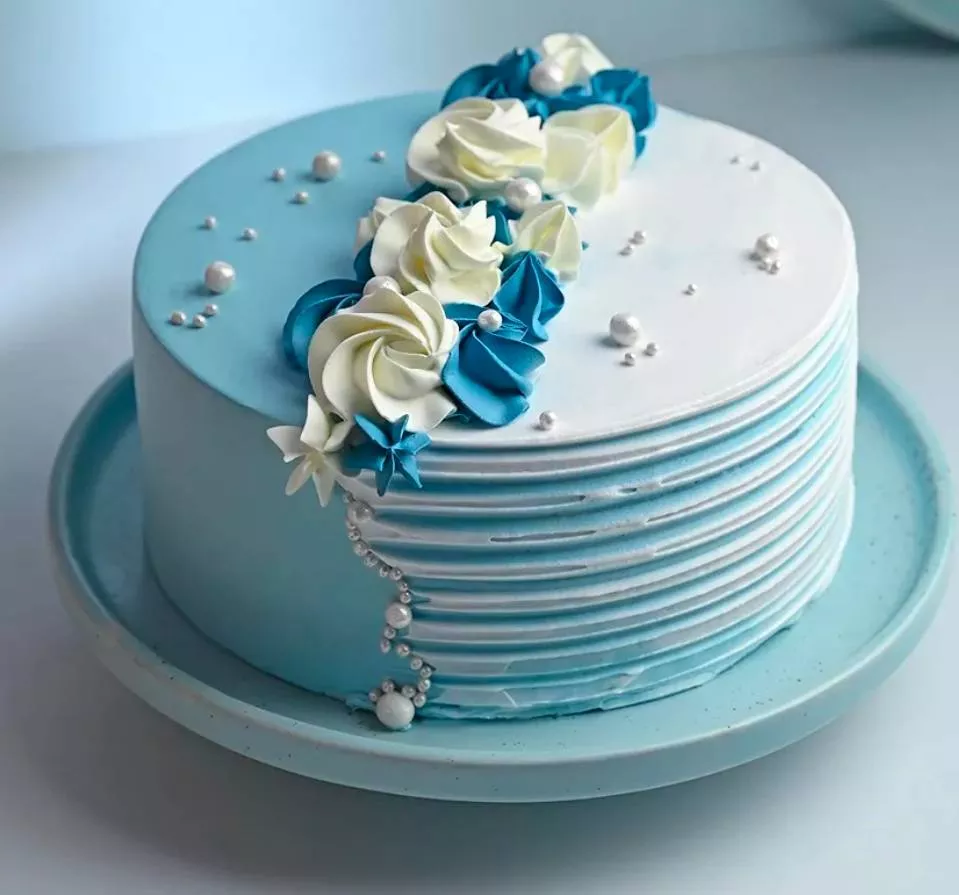 Elegant blue and white Floral Cake in PALWANCHA decorated with floral designs, perfect for celebrations and special occasions