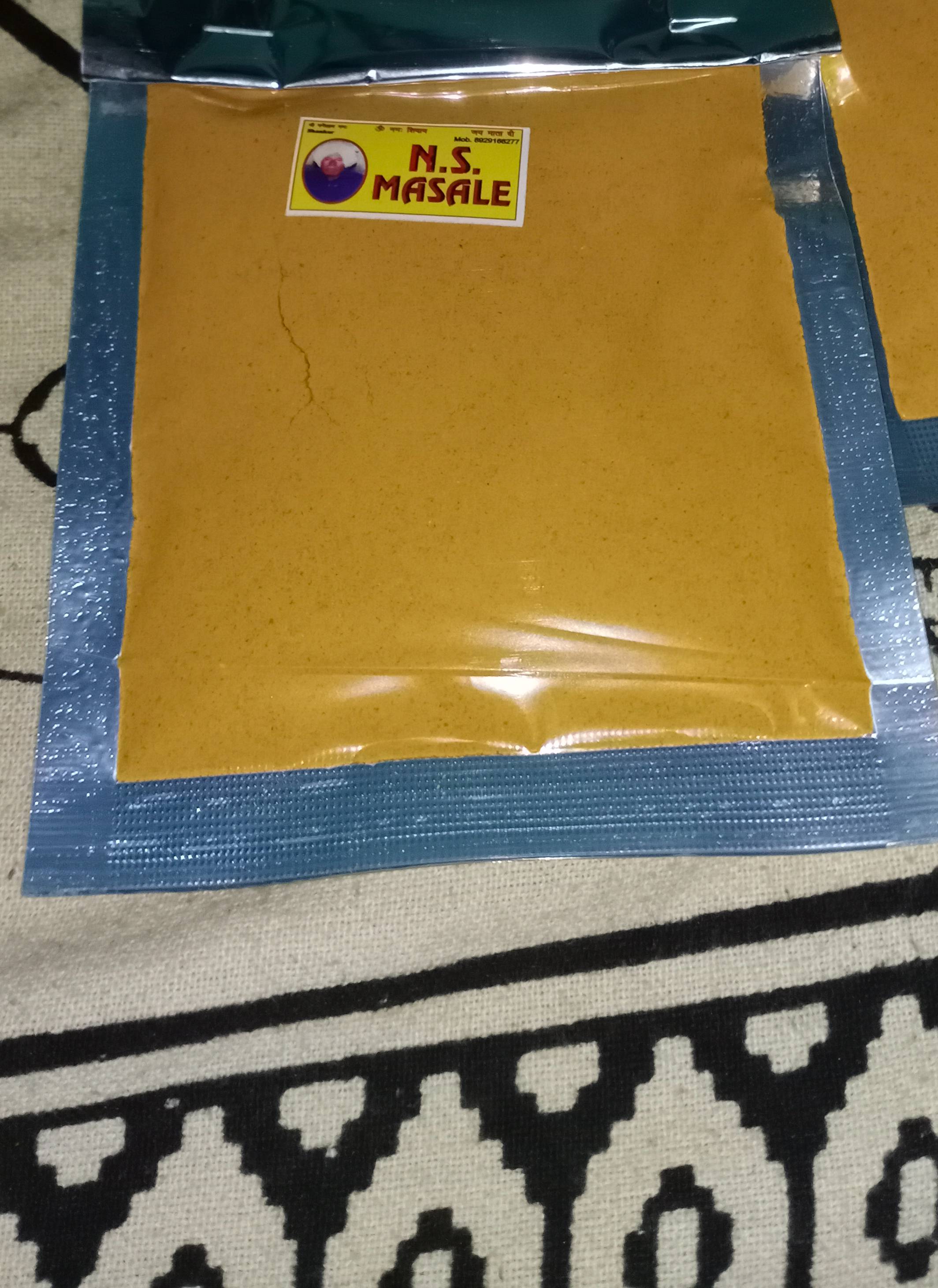 Organic Turmeric Haldi supplement in a vibrant yellow hue, packaged attractively with health benefits highlighted, available  - Image 4