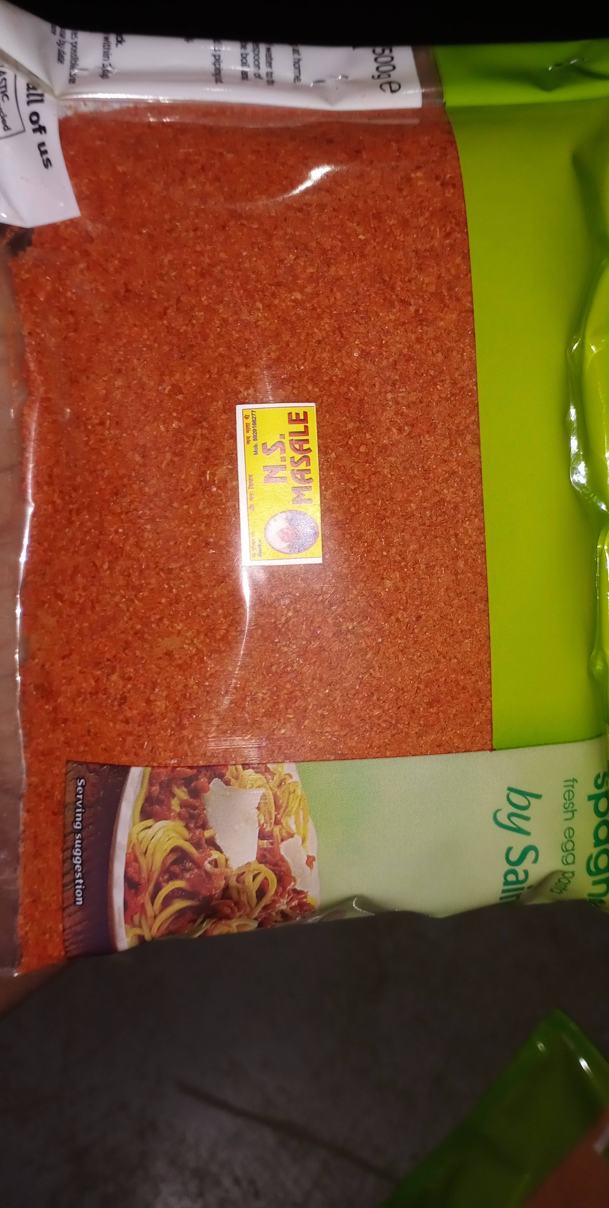 Finely ground red chilli powder in a bowl, vibrant red color, showcasing its spice quality and freshness, from SHANKAR in Son - Image 3
