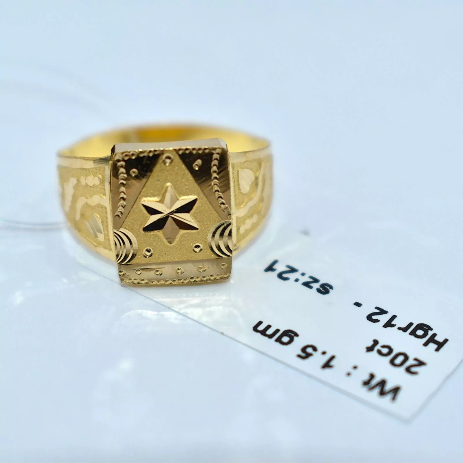 Elegant NIDHI NARVARIAABHUSHAN gold ring showcasing intricate design and premium craftsmanship, located in Jabalpur.