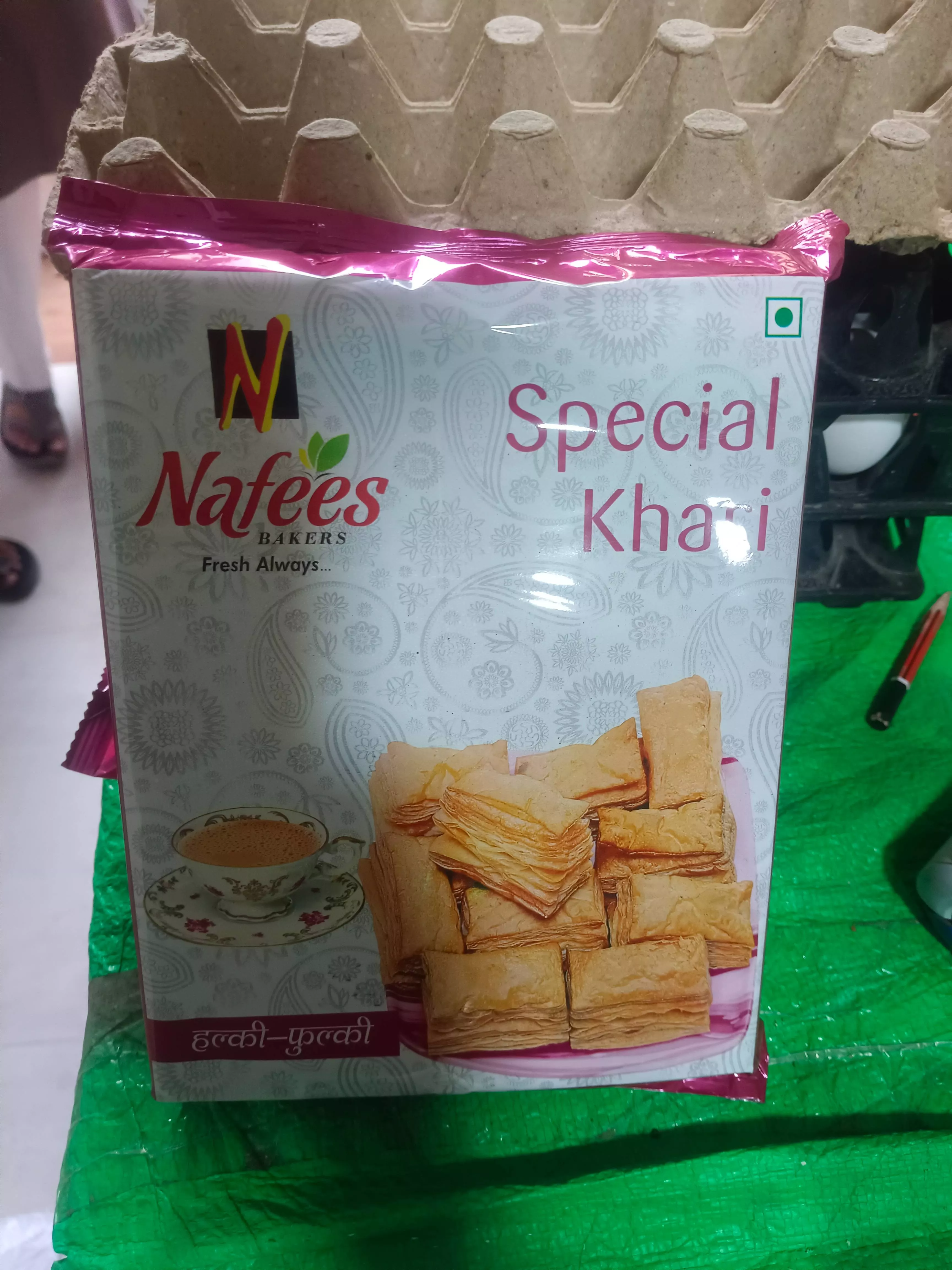 Flaky and buttery Nafees Special Khari Biscuits from Pakiza Kirana in Indore, arranged on a plate, perfect for tea-time.