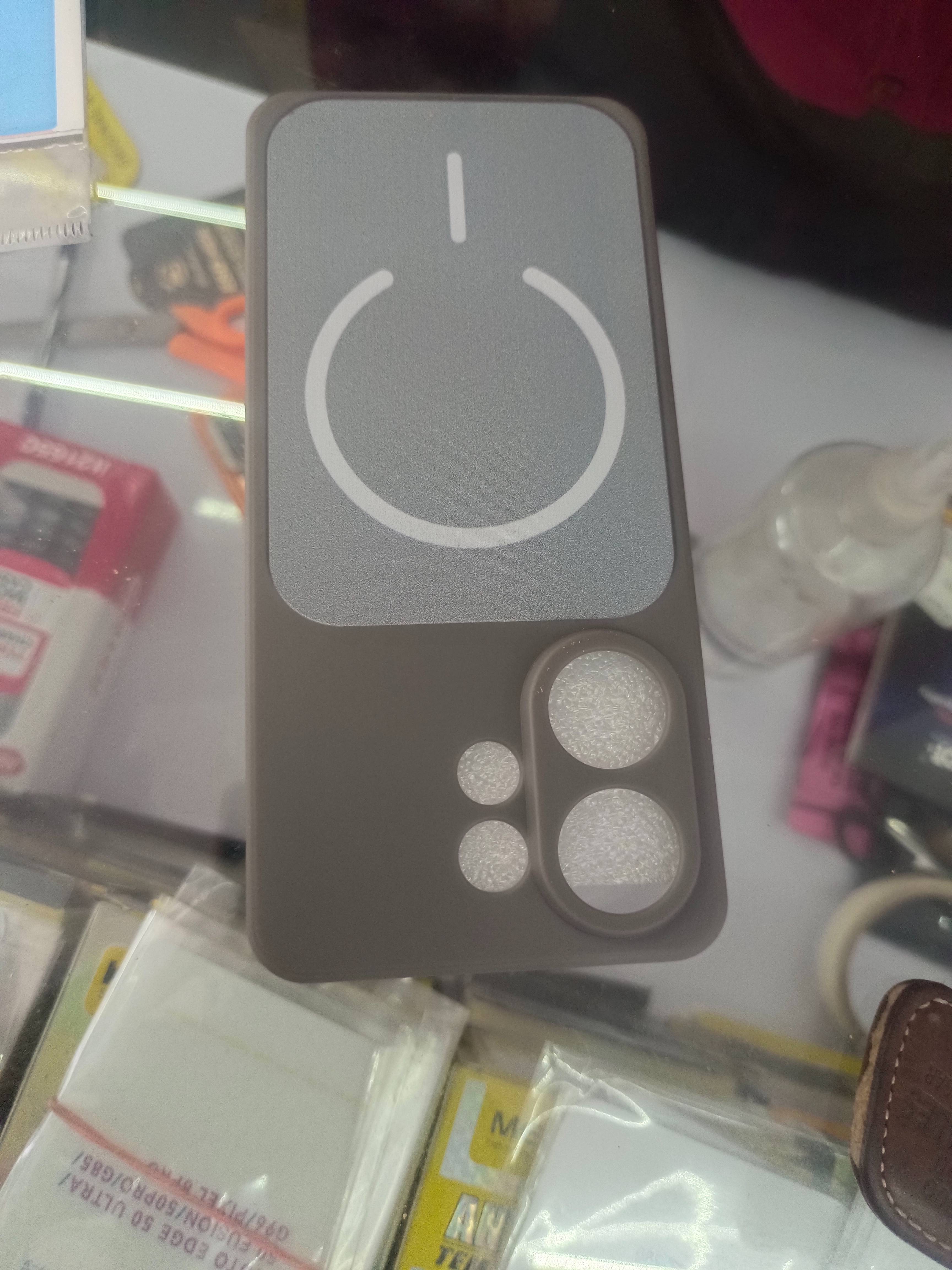 Stylish mobile cover designed for various phone models, featuring a sleek exterior and protective features, available at M S 