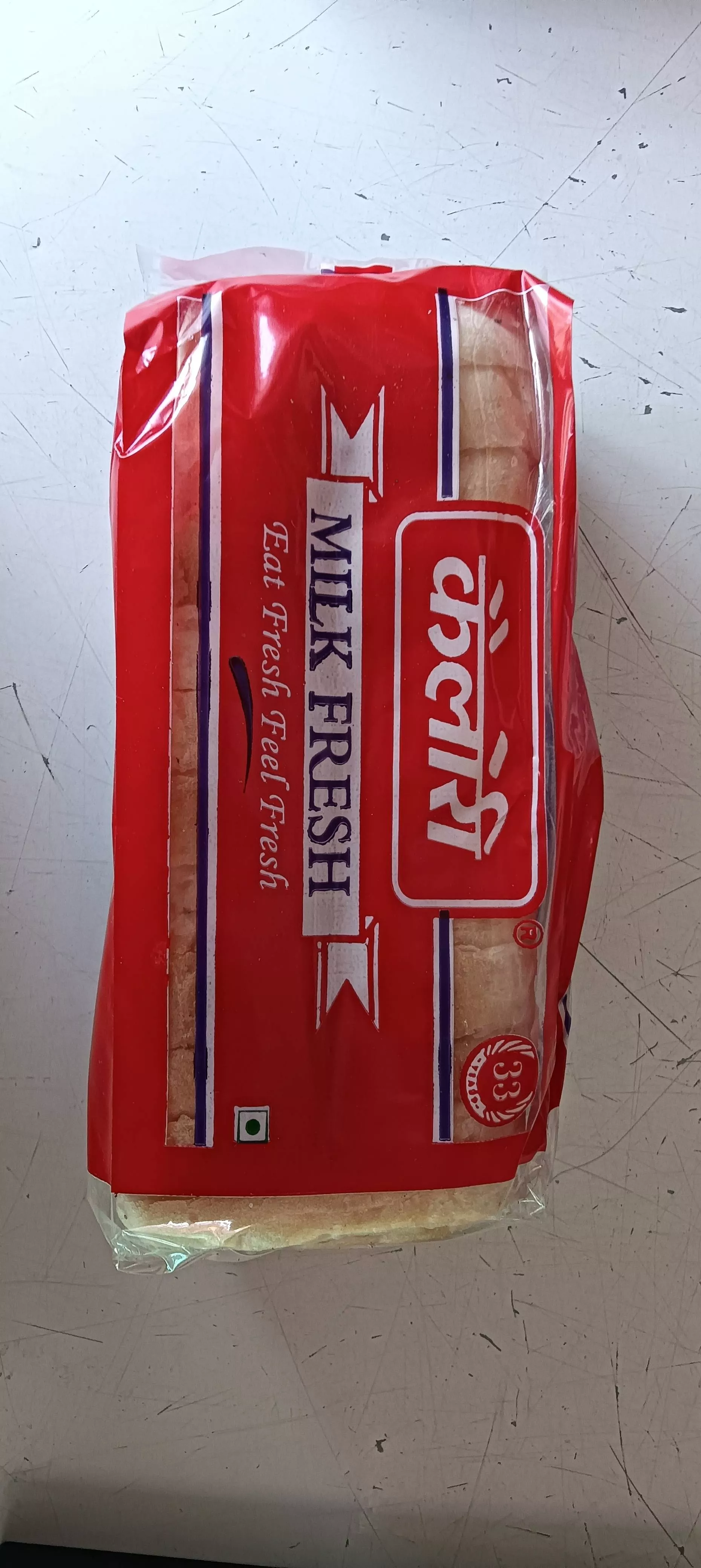 Soft and fluffy Kanak Fresh Milk Bread loaf from SAHU BAKERIES in Rawatbhata, ideal for sandwiches and toast.
