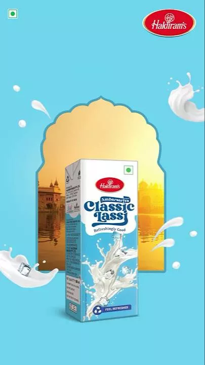 Creamy Haldiram Classic Lassi in a glass with a traditional Indian design, featuring a refreshing texture, available in Jaunp