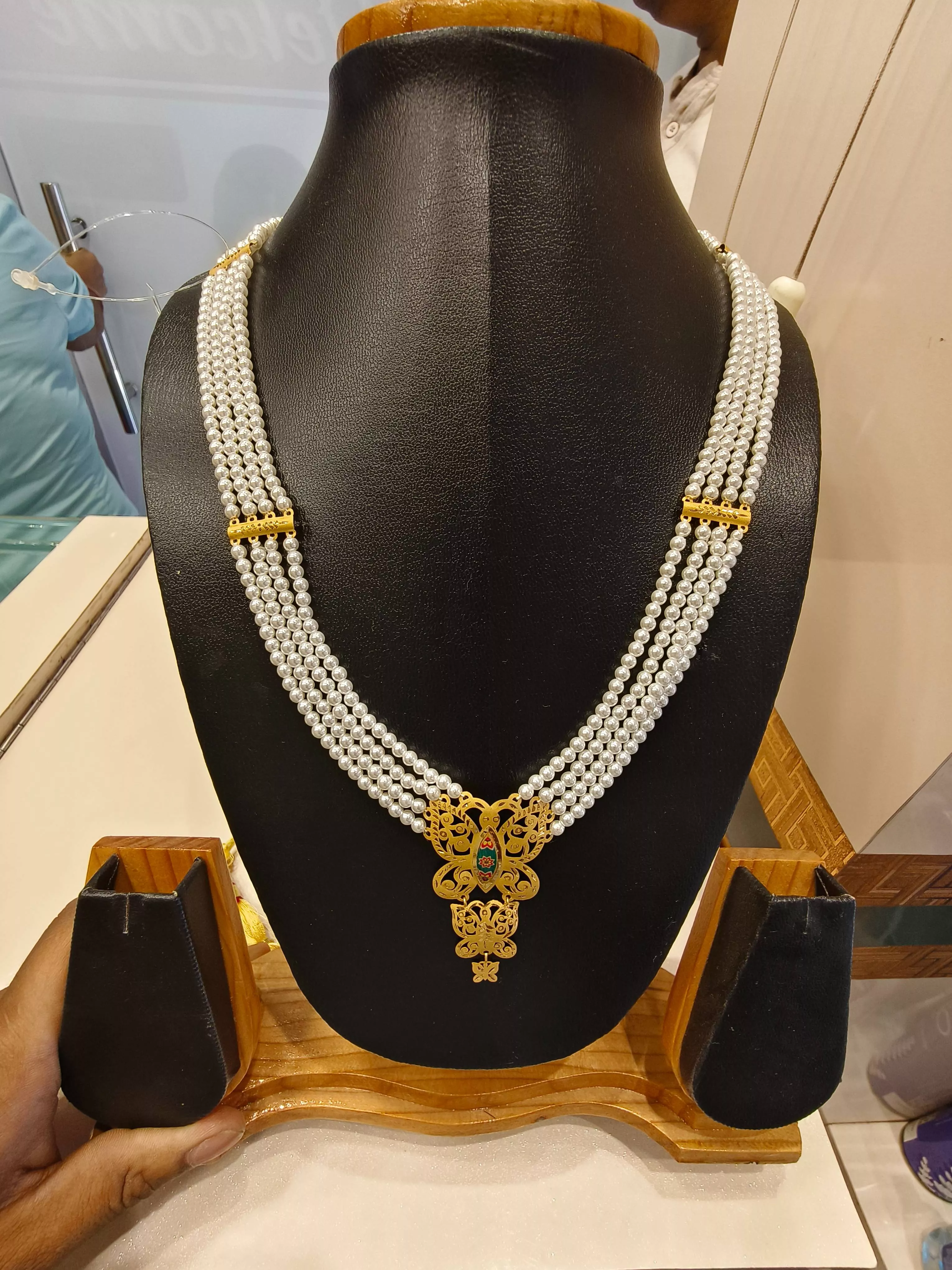 Gold Puthi Sita Har necklace featuring intricate designs and premium gold craftsmanship displayed elegantly in TWENTYFOUR NOR