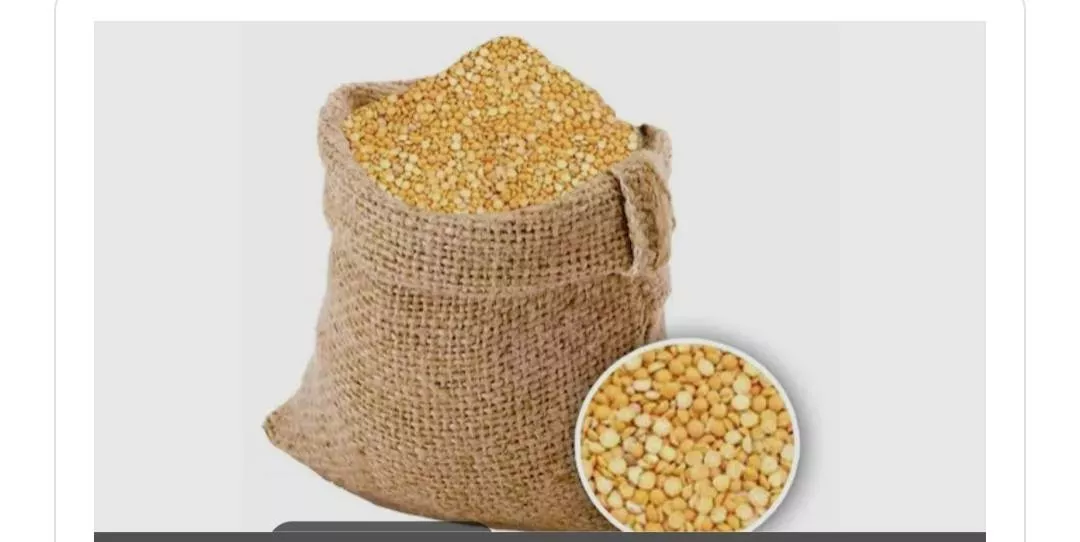 High-quality split yellow peas presented in a bowl, showcasing their vibrant yellow color and texture, available at THAKUR KA