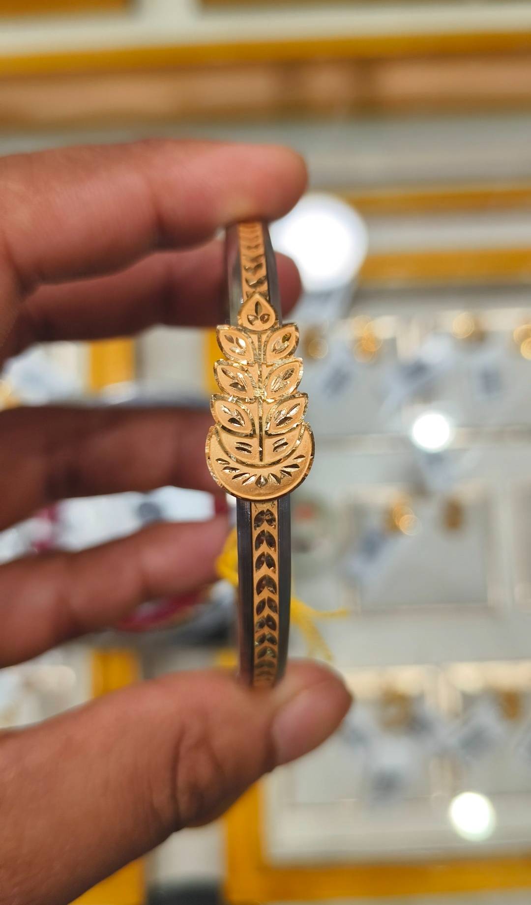 Elegant Jewelry/Gold-capped Loha Badhano from SHIV GOURI JEWELLERS in TWENTYFOUR NORTH PARGANAS, showcasing intricate designs