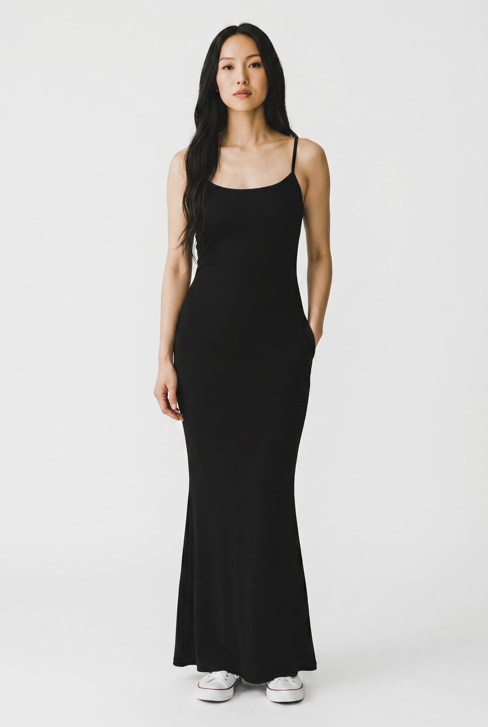 Elegant black maxi dress featuring a flowing design suitable for any occasion, available at VEIL ELEGANCE in Sadar Noida