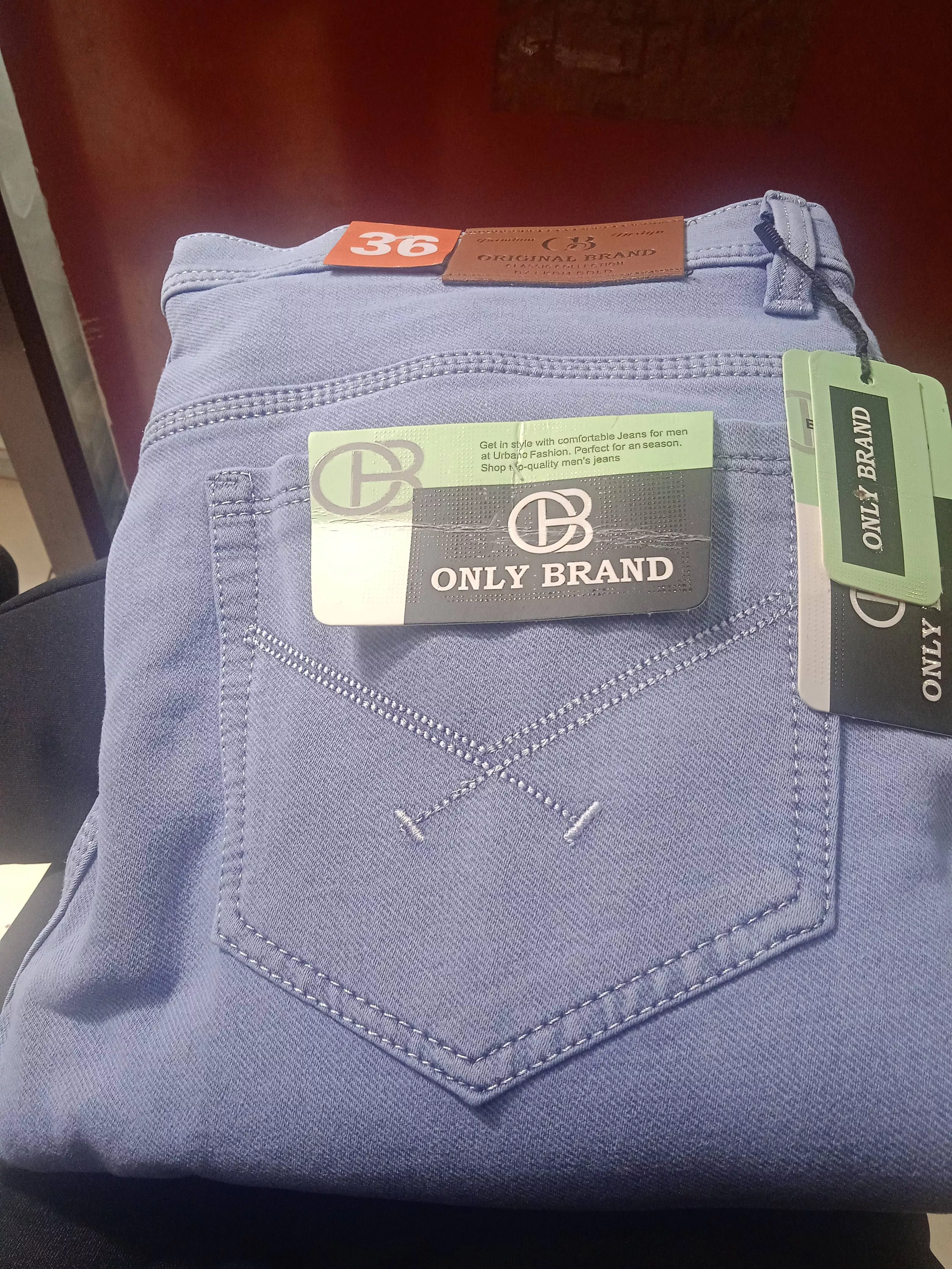 Stylish blue denim jeans from Abhishek Garments in Ismailabad, showcasing a modern cut and high-quality fabric.