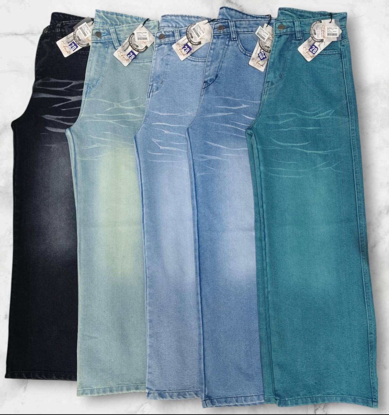 Five denim jeans in various colors from Kritika Fashion in Kharar displayed together for versatile styling options
