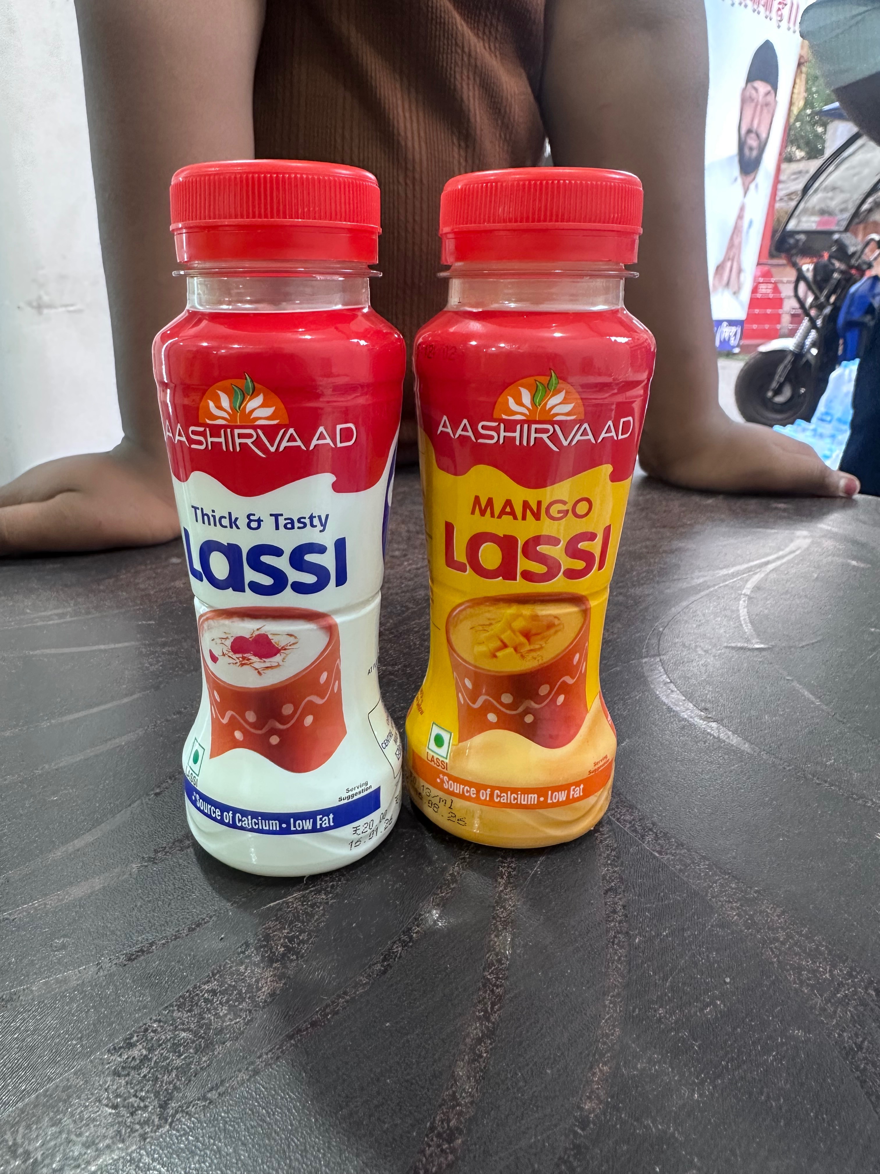 Aashirvaad Lassi Pack containing Thick & Tasty Lassi and Mango Lassi available in Jamshedpur