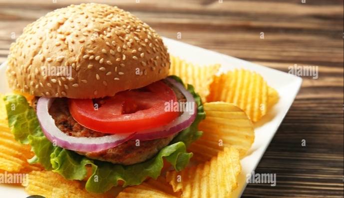 Delicious Classic Veggie Burger with crispy chips in Bhawanigarh