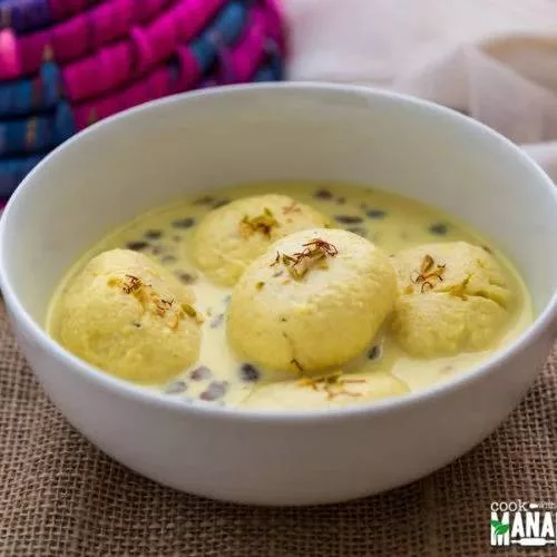 Delicious Rash Malai from ParTeek Sweets in Chicpawan, featuring a creamy texture and garnished with nuts for added flavor.
