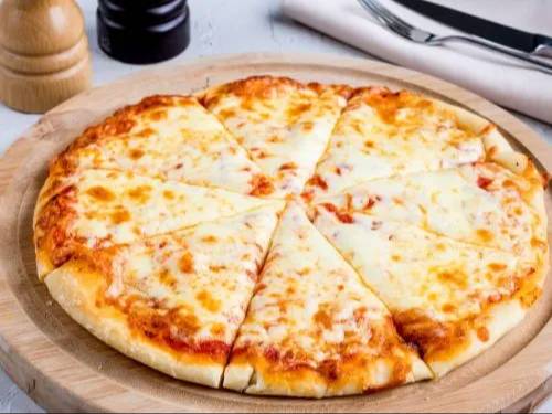 Delicious Cheeze Pizza topped with premium ingredients from PARTEEK SWEETS AND RESTAURANTS in CHICPAWAN, showcasing a melty c