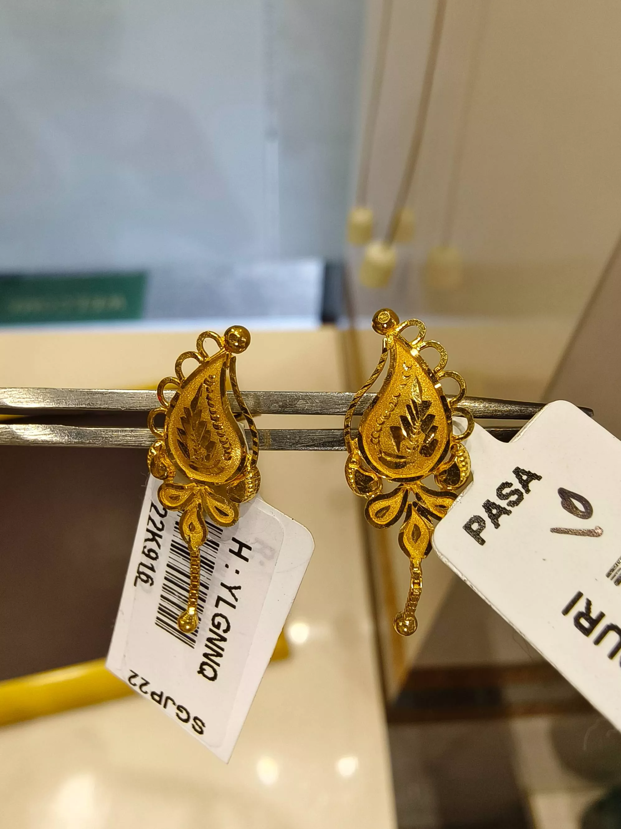 Elegant Gold Earrings designed to elevate style, showcasing intricate craftsmanship in TWENTYFOUR NORTH PARGANAS.