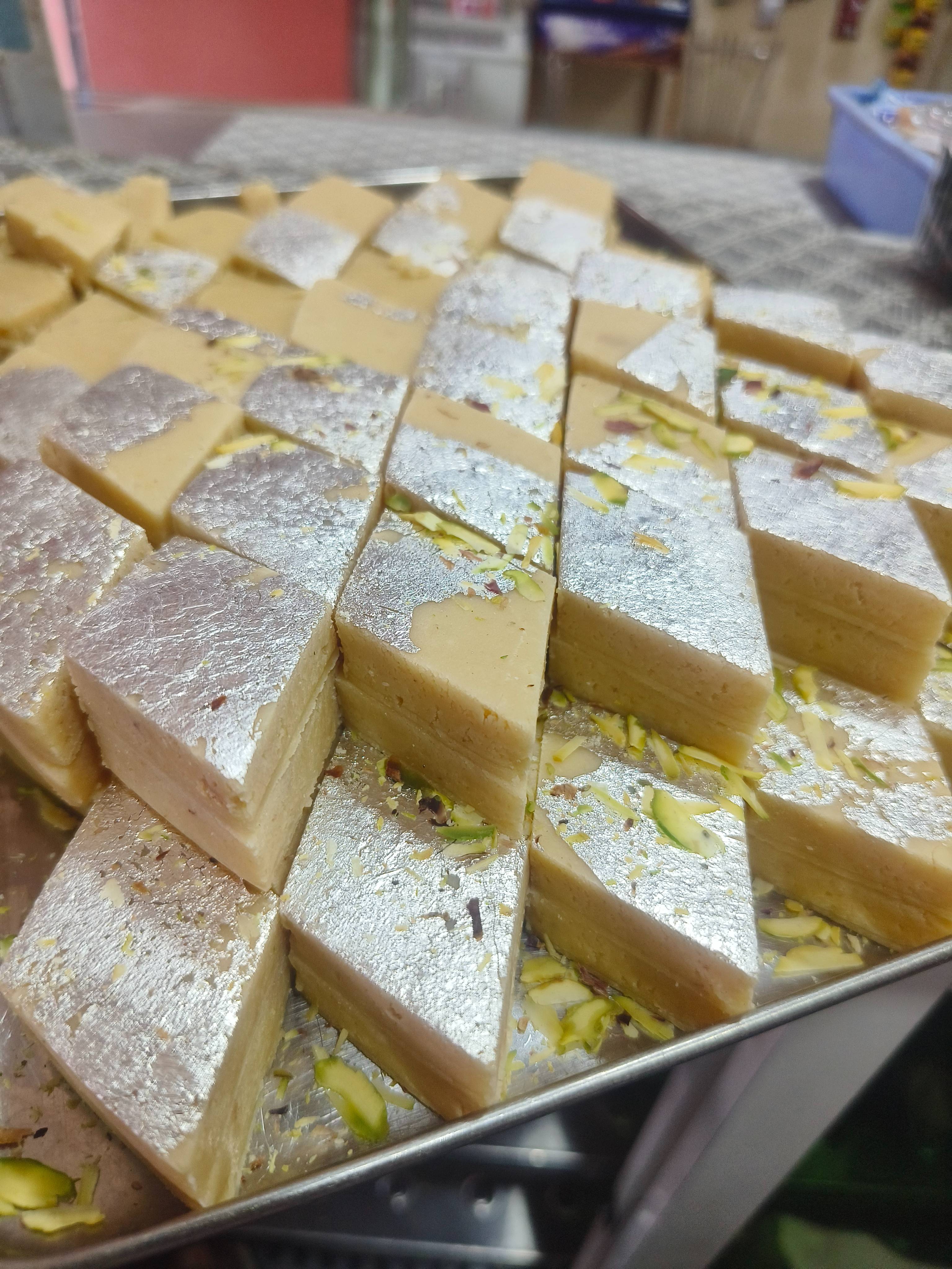 Delicious ParTeek Sweets Malai Katli, a rich cashew-based sweet treat, elegantly presented on a plate in Chicpawan.