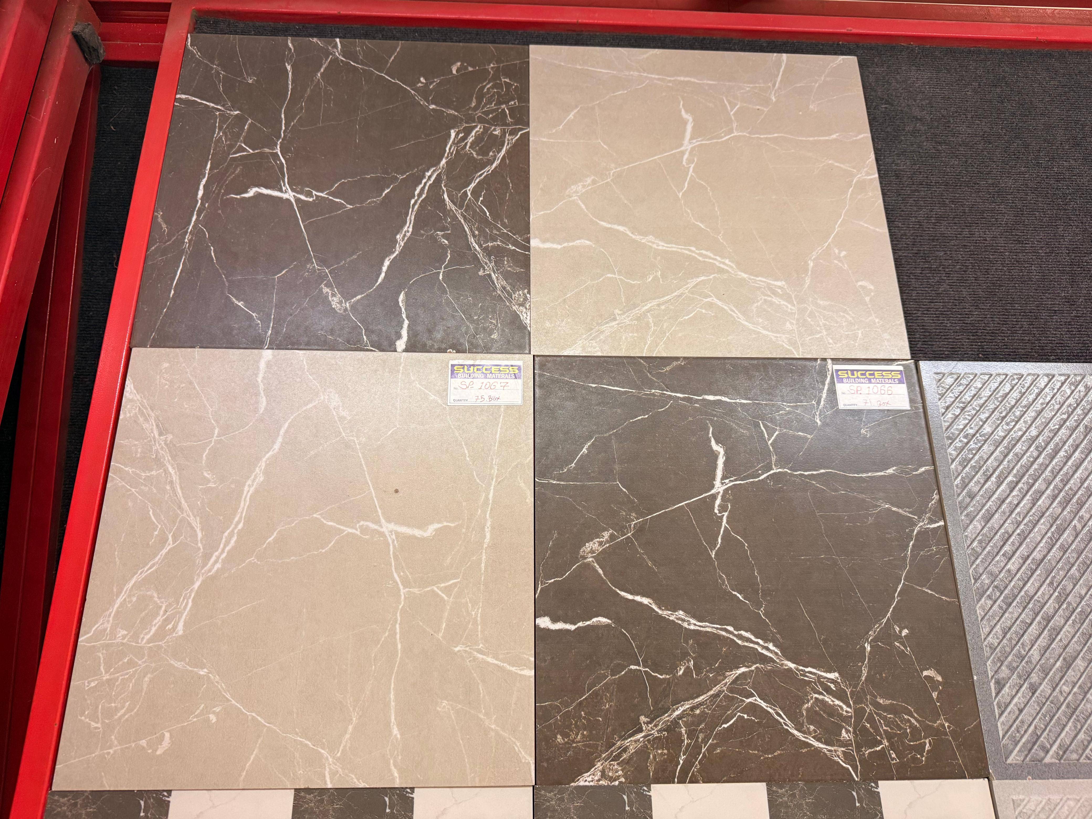 Stylish Tyles from Bharat Building Materials in Chandwad, showcasing a variety of colors and designs suitable for elegant flo - Image 1
