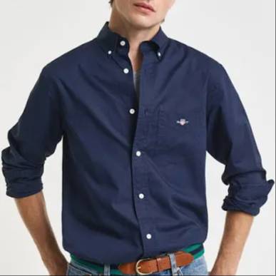 Stylish navy blue cotton shirt with button-down collar and cuffs from SURINDER PAL in Adamwal, designed for comfort and smart