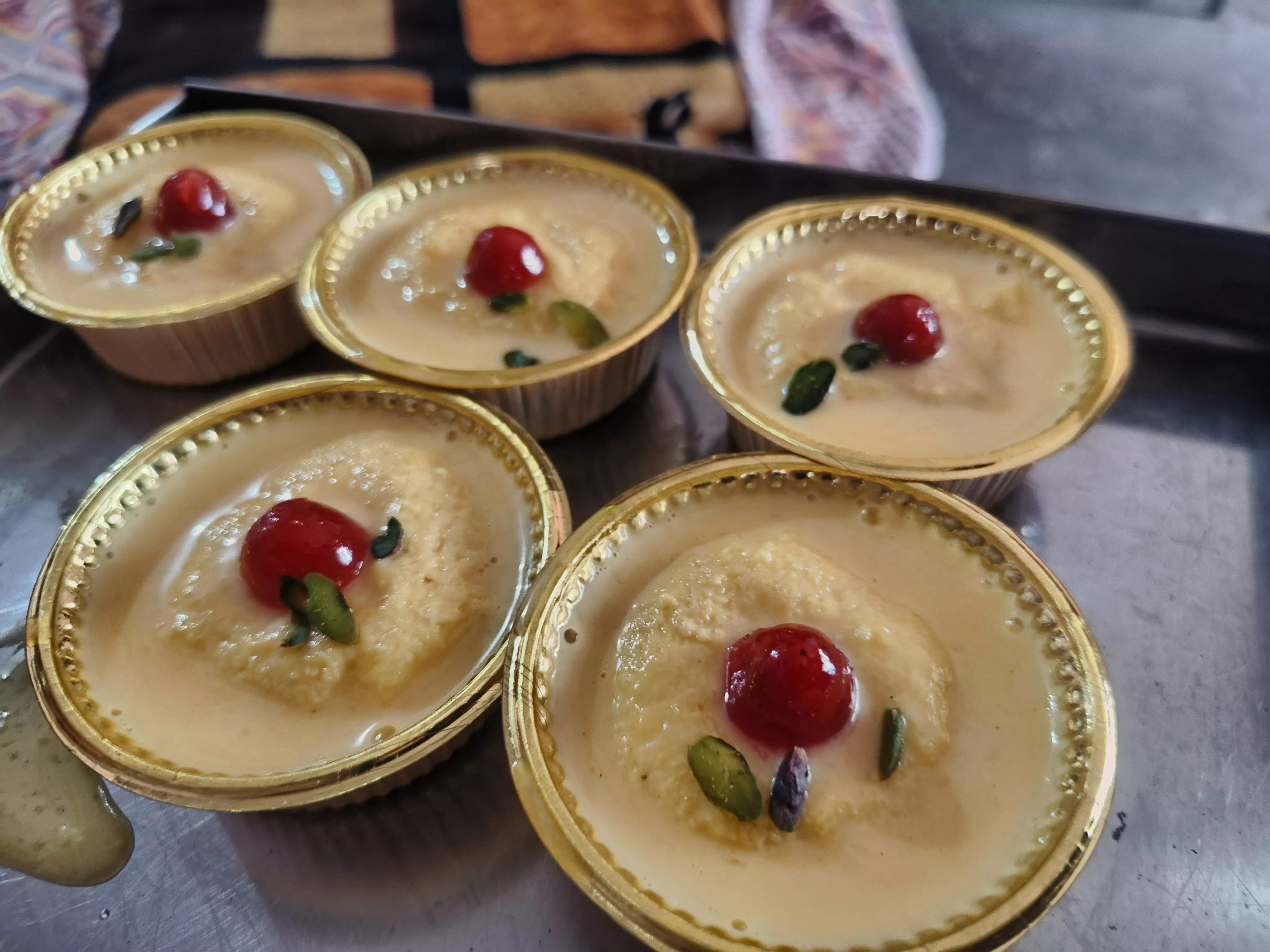 Delicious Rasmadhuri Dessert Cups, filled with creamy rasmalai, perfect for celebrations, from PARTEEK SWEETS AND RESTAURANTS