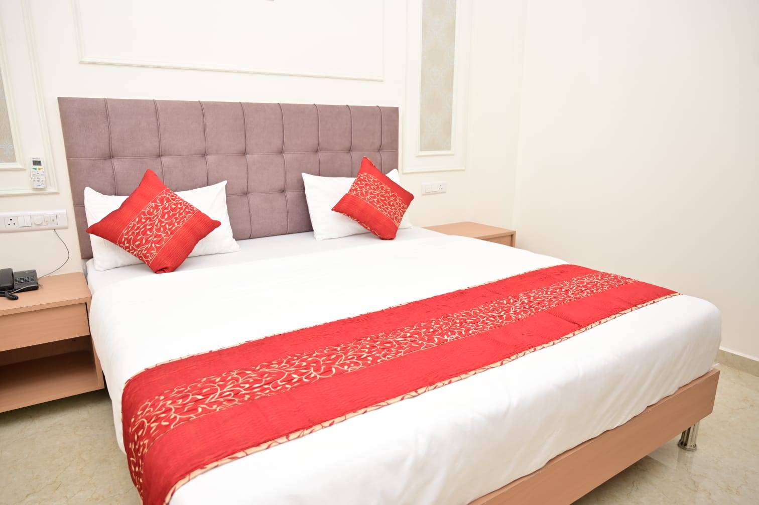 Luxurious accommodations at Rooms & Banquet Hall in Sirsa featuring Deluxe and Suite options