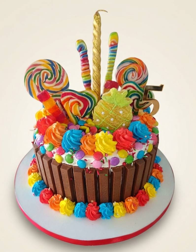 Vibrant Rainbow Candy Chocolate Cake showcasing colorful layers and toppings in Bangalore