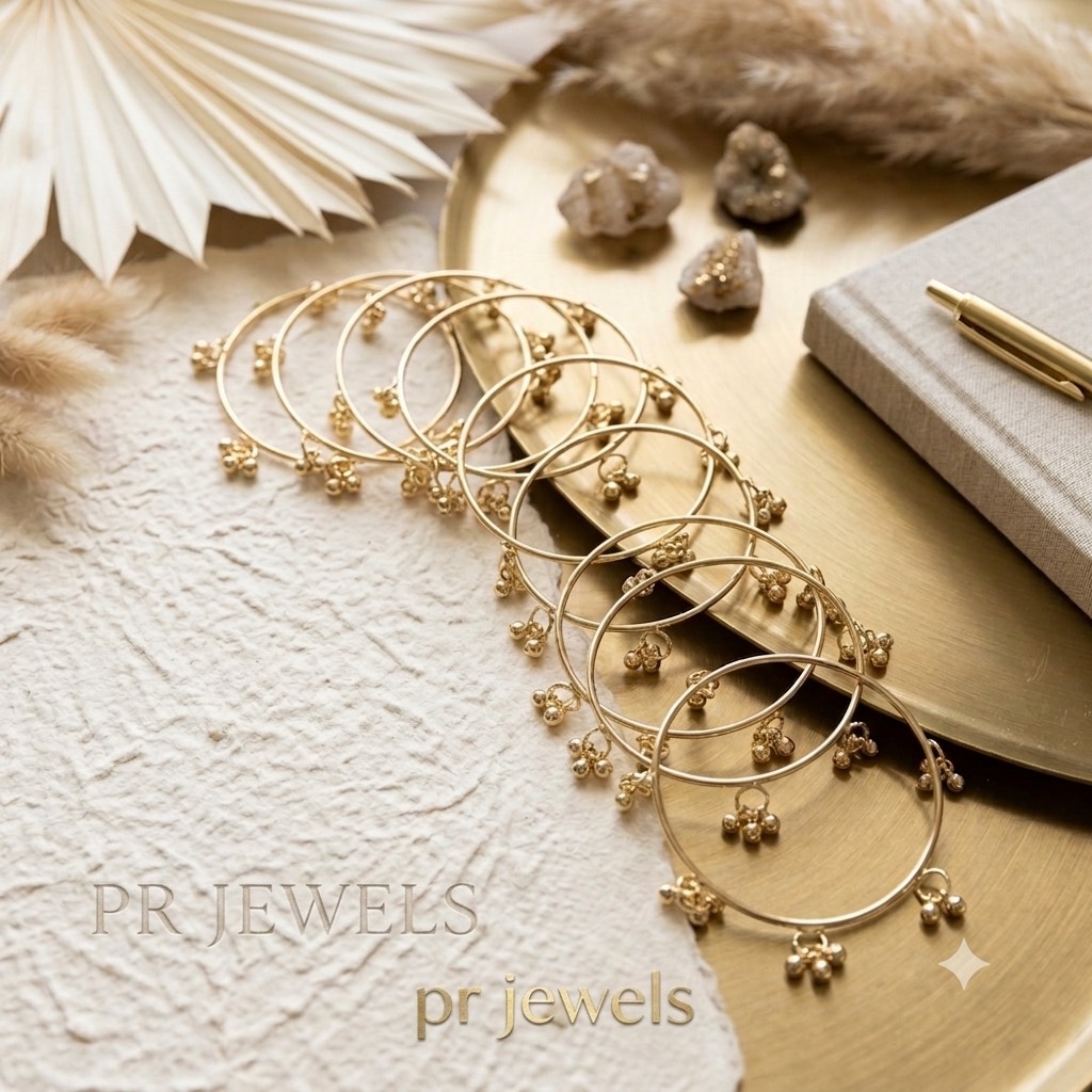 Elegant floral pattern golden bangles displayed beautifully in Hathras - Image 1
