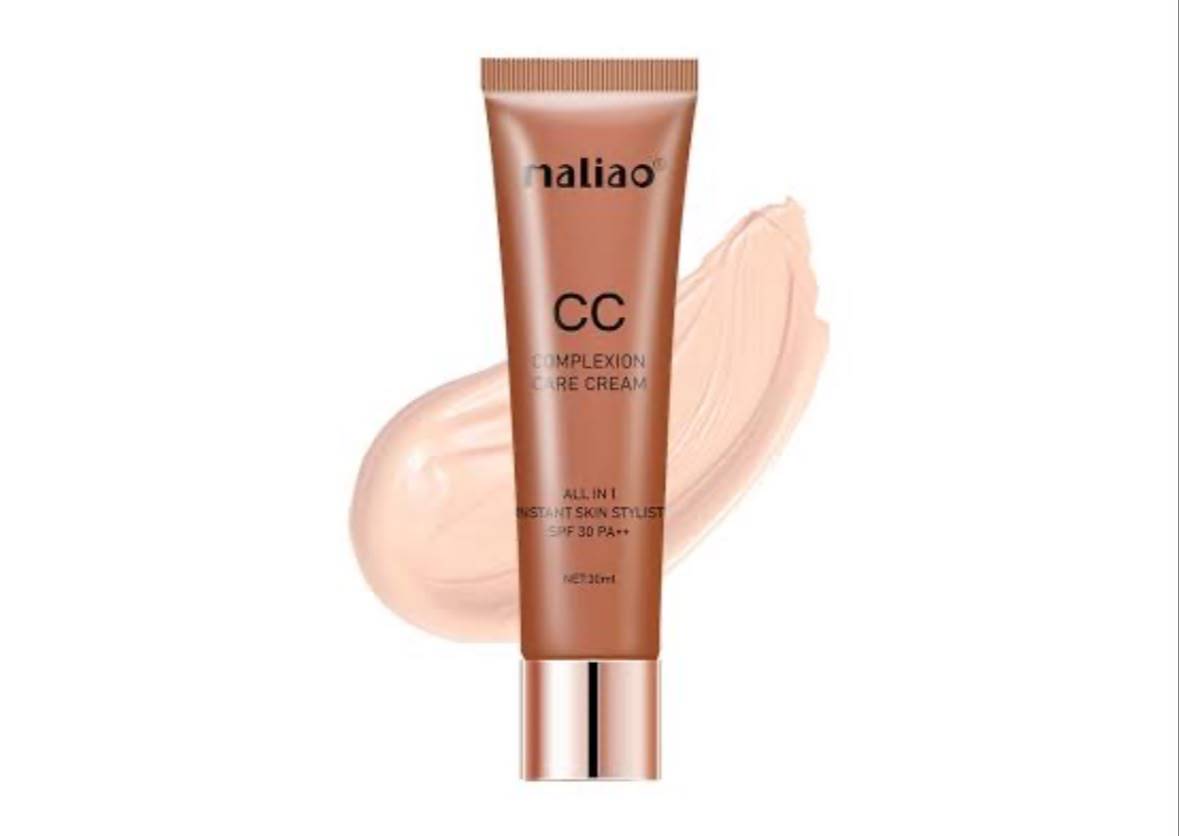 Maliao CC Complexion Care Cream displayed on a wooden table in Moga