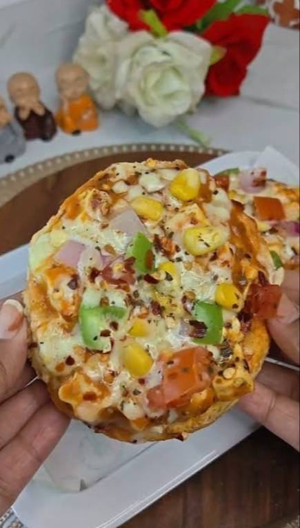 Delicious Bun Pizza burger with fresh veggies and cheese from Bhawanigarh | FOUR 10 CAFE