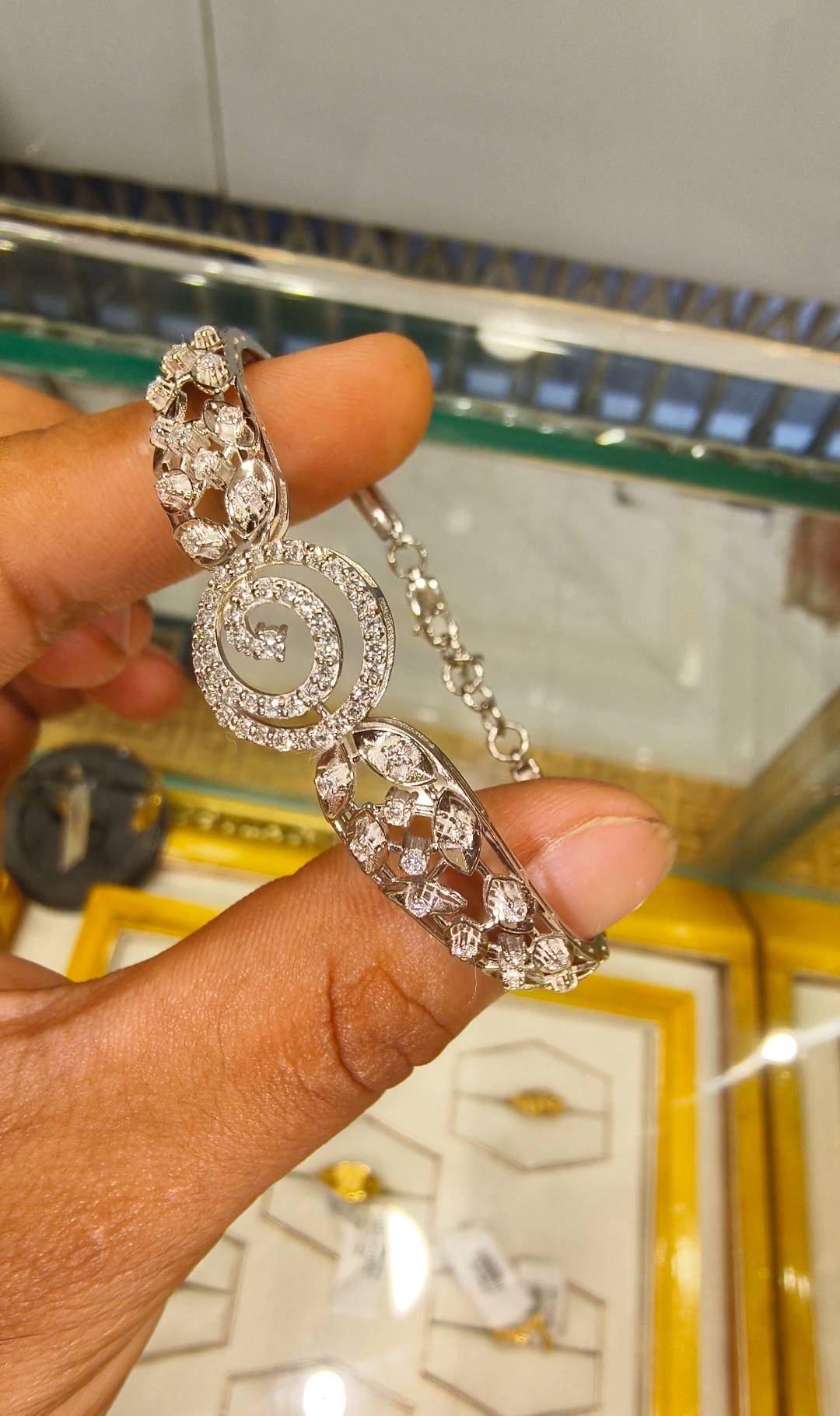 Elegant Swirl Diamond Bracelet featuring sparkling diamonds in TWENTYFOUR NORTH PARGANAS