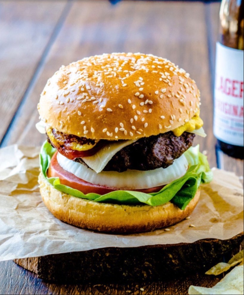 Delicious Gourmet Beef Burger in Sultanpur Lodhi with fresh toppings and sesame seed bun