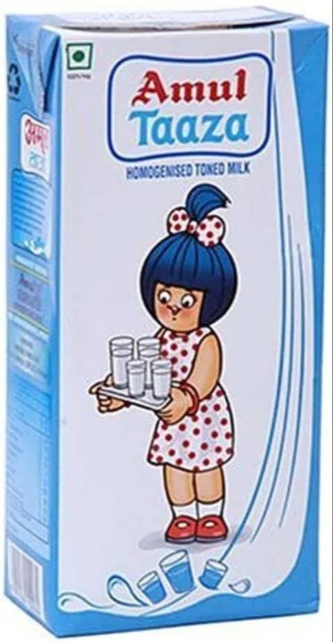 Fresh Amul Taaza milk carton with a label in NAGAON