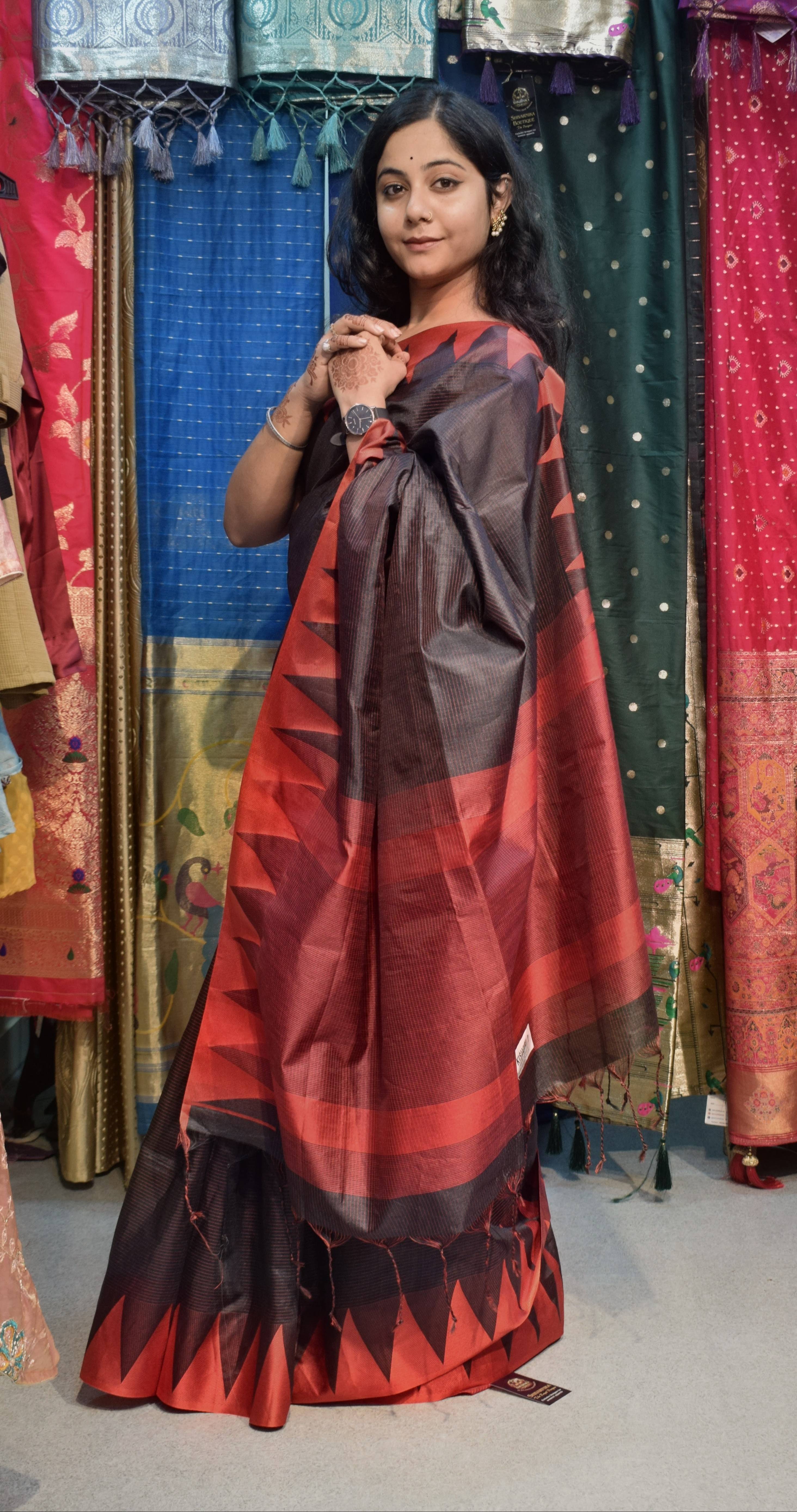 Elegant red and black Silk Saree featuring geometric patterns in GORAKHPURMP