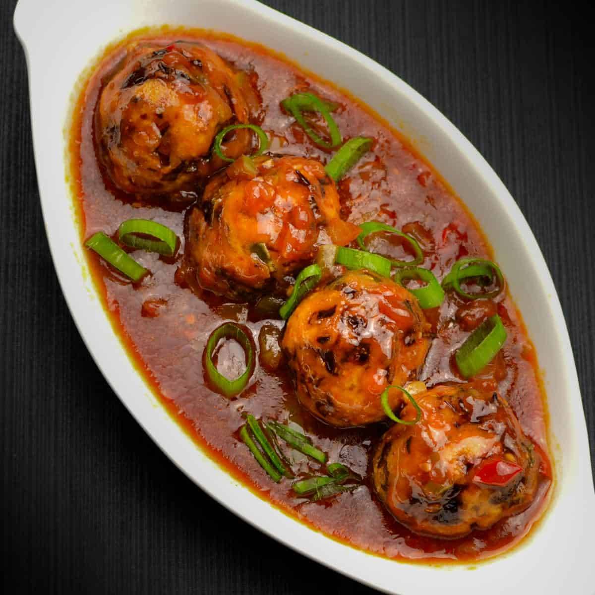 Delicious Vegetable Manchurian served with sauce at WOKIFY SNACKS in Kolkata