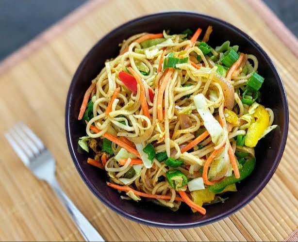 Delicious Vegetable Hakka Noodles served in a bowl, showcasing fresh vegetables, Kolkata