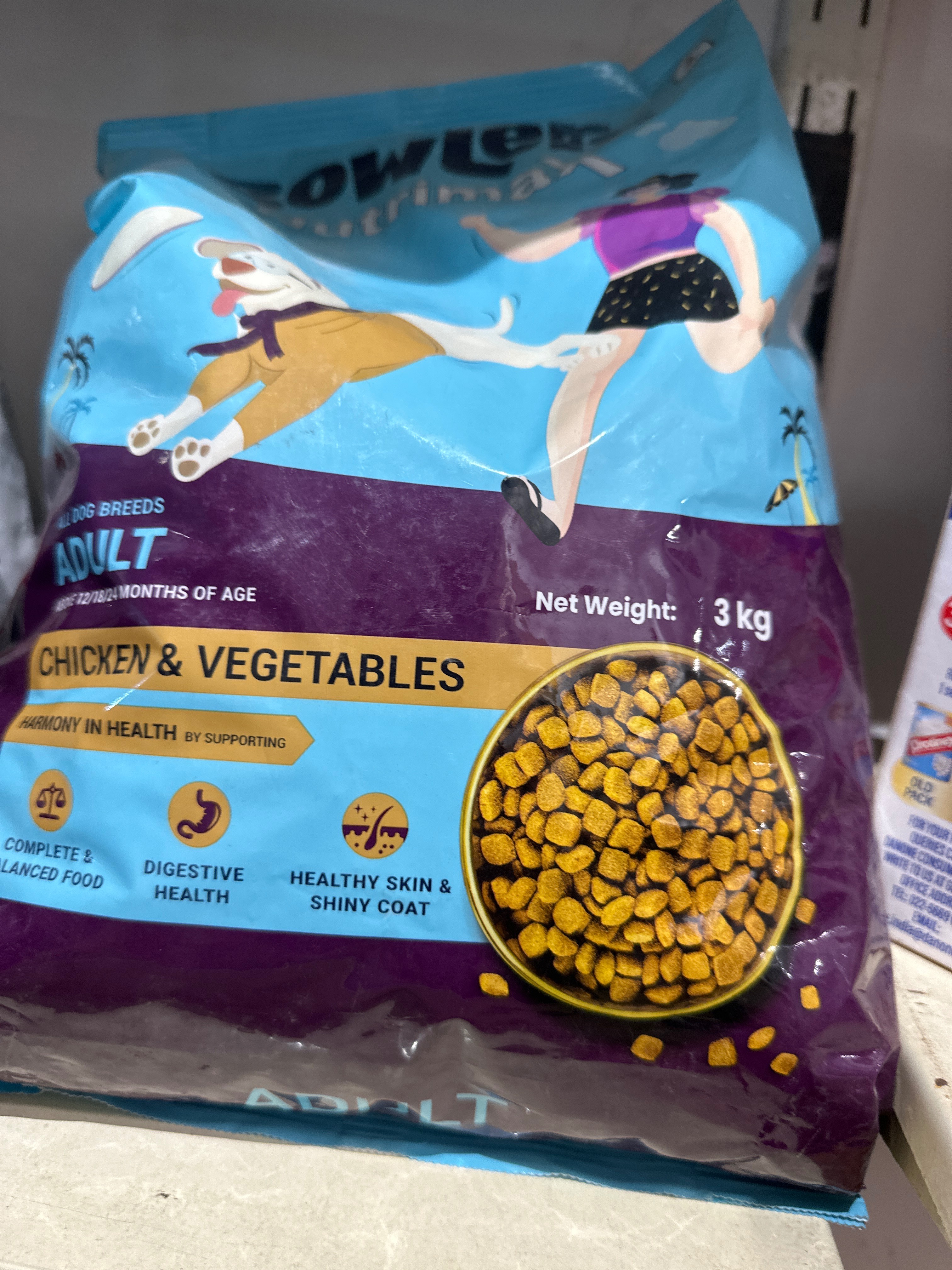 Nutrimax Chicken & Vegetables Dog Food packaging with chicken and vegetables, Kharar