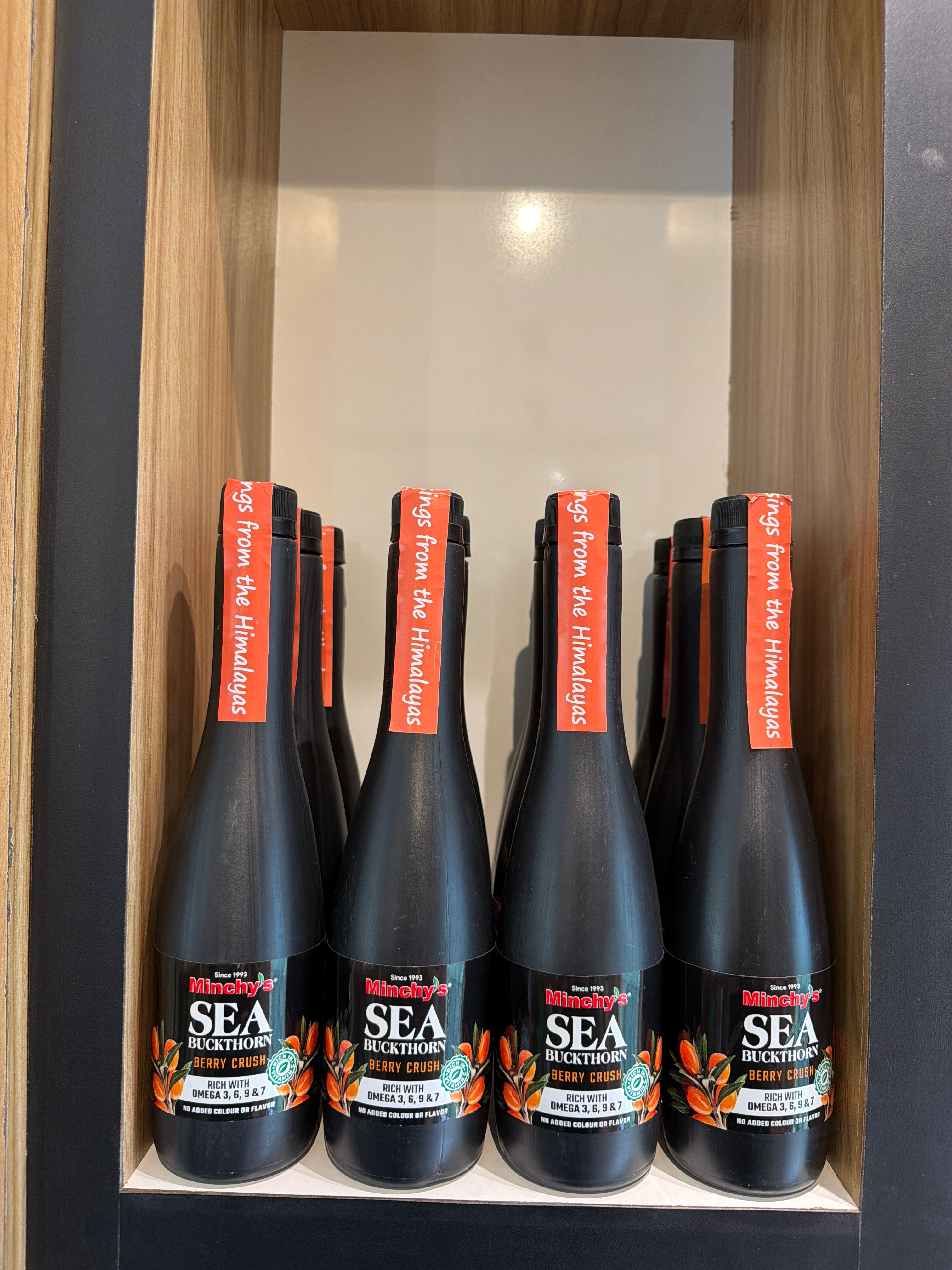 Sea Buckthorn Berry Crush bottle with berries, Kandaghat