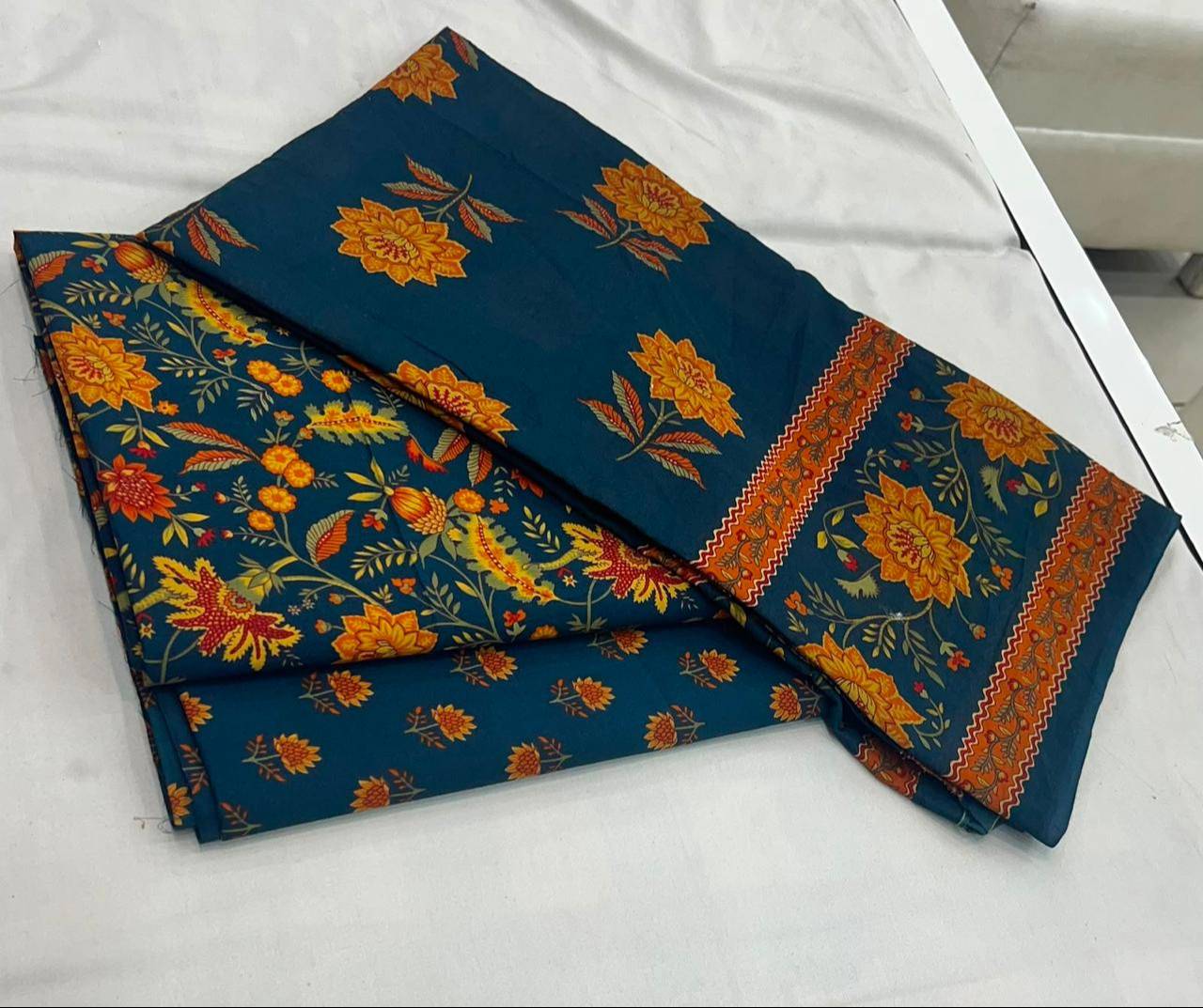 Stylish Bombey Print Suit displayed elegantly in Longowal, showcasing vibrant patterns and design. - Image 1